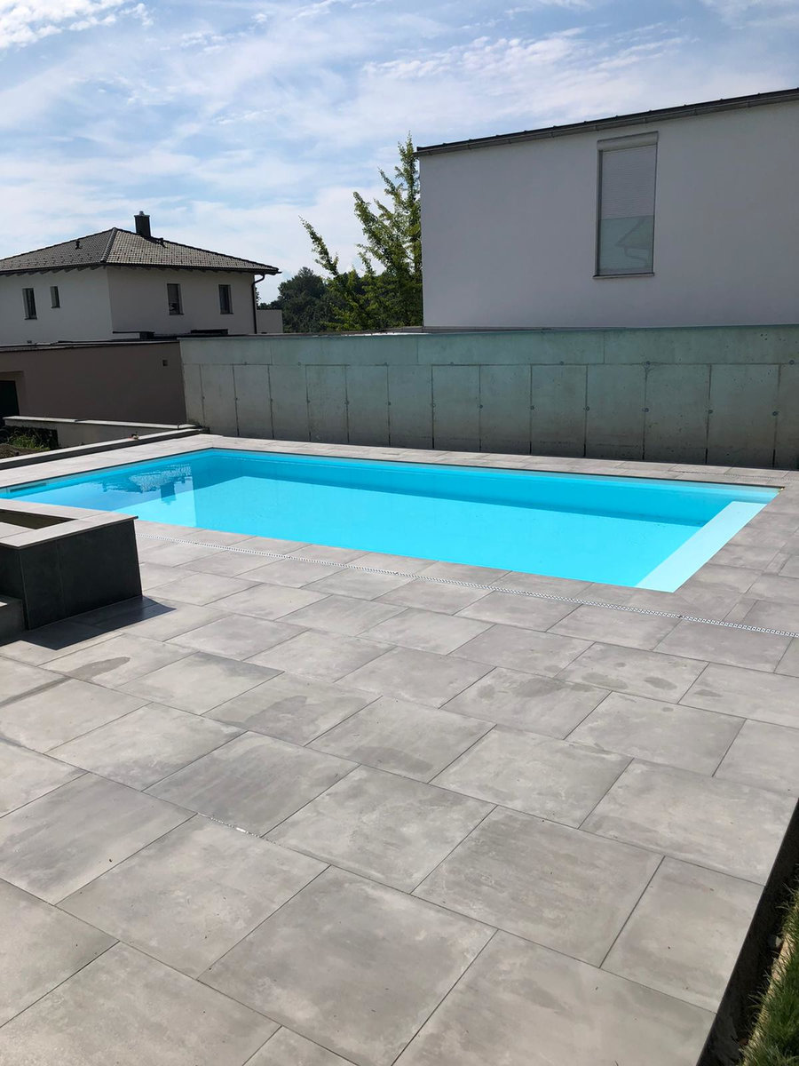 Terrasse mit Schwimmbad-Umrandung von Meister Granit