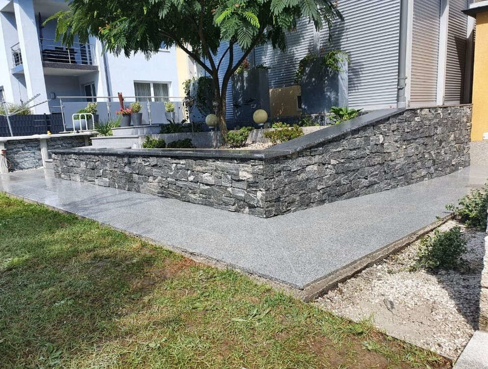 Terrassenmauer von Meister Granit